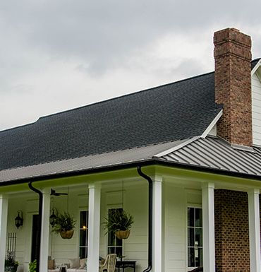 How to decide between a metal and shingle roofing system Shingle Roof With Metal Porch, White Asphalt Shingle Roof, Metal And Shingle Roof Combination, Types Of Shingle Roofs, Metal Roof Vs Shingle Roof, How To Shingle A Roof Valley, Metal Roof Colors, Roofing Materials, Roof Shingles