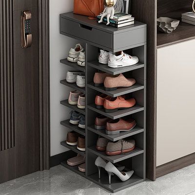 Our shoe storage rack is sturdy, durable, and space-efficient, making the most of your available space. Keep your shoes neatly organized for a clean and tidy home. The top features a storage drawer for storing keys and other small items, while the top layer can hold bags, decorations, and more. ZCHUANG | ZCHUANG Pair Shoe Rack brownManufactured Wood in Gray Wood | 12 | Wayfair | Organization Shoe Storage Garage, Shoe Storage Ideas Diy, Vertical Storage Ideas, Front Door Shoe Storage, Wooden Shoe Rack Designs, Mudroom Shoe Storage, Garage Shoe Storage, Vertical Shoe Rack, Shoe Storage Ideas