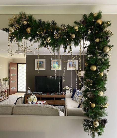 Cute Christmas Decorations For House, Vaulted Ceiling Christmas Decor, Christmas Decor For Pendant Lights, Christmas Garland Ceiling, Christmas Garland Backdrop, Unique Garland Ideas, Ceiling Beam Christmas Decor, Empty Wall Christmas Decor, Fill Up Wall Space