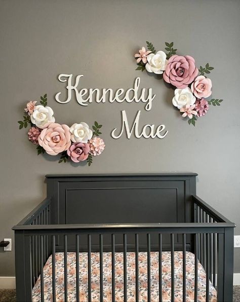 You can transform your nursery space with a beautiful paper flower wall arrangement. 🌸 -nursery wall flowers-mauve-blush- -white paper flowers-wall flower arrangement-baby shower decor-bridal shower decor-wedding decor- 2 Large Roses 13" 5 Medium Roses 8" 3 Hydrangeas 6 Lillies (3 sets of two)  14 Leaves 3 Butterflies  Hang with adhesive hooks. I get my hooks at the Dollar Tree. You get nine for $1. They hold very strong and don't damage your walls when removing. Paper flowers are a wonderful a Nursery Themes For Girls, Paper Flower Room Decor, Flower Wall For Nursery, Paper Wall Flowers, Blush Pink Baby Nursery, Roses Nursery, Pink Mauve Nursery, Rose Color Nursery, Wall Decor For Nursery