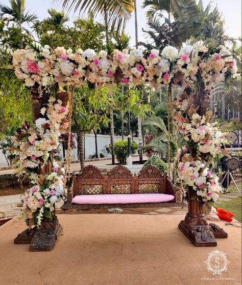 Your special day needs a special swing and we are dedicated to making it happen for you in the most magical way possible. Lots of kaleidoscopic floral ornaments, an explosion of colours with a hint of earthy tones blended together to create magic for you. #samanidecorators #weddingdecorator #weddingdetails #bridalswing #bridalseat #weddinginspo #floralornaments #floraldecor #weddingdecorations #bride #brideswing #weddingdecorationideas #weddingdecor #decorideas #floraldecor #weddingdecorideas # Room Swing, Floral Ornaments, Stage Decoration, Engagement Decorations, Stage Decorations, Home Wedding, Earthy Tones, Floral Decor, Wedding Details