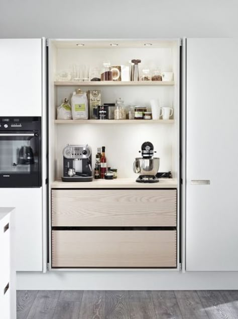 Interior inspo: Pocket doors. A breakfast bar I wouldn't mind having out on display all day long! Such well designed kitchen cabinetry Desain Pantry, Home Coffee Stations, Hidden Kitchen, Dark Cabinets, Dream Kitchens, Pantry Design, Kitchen Trends, Cabinets Kitchen, Kitchen Reno