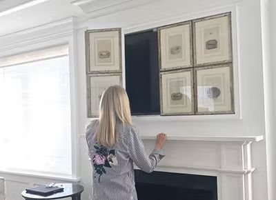 10 Clever Ways to Hide a TV In Any Room - PureWow How To Disguise Yourself, Hide Your Tv, Gracie Wallpaper, Drawer Sliders, Tv Over Fireplace, Hidden Tv, Hinged Frame, Online Mattress, Box Bed