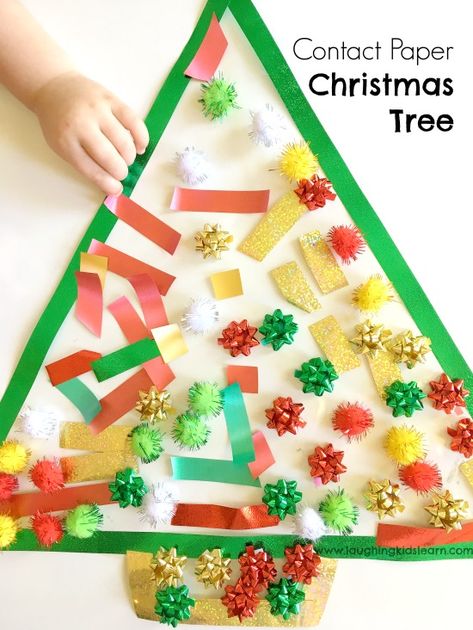 Toddler Christmas activity using sticky contact paper - Laughing Kids Learn Christmas Activities For Toddlers, Christmas Crafts For Toddlers, Christmas Crafts For Kids To Make, Christmas Activity, Paper Christmas Tree, Christmas Activities For Kids, Preschool Christmas, Crafts For Kids To Make, Toddler Christmas