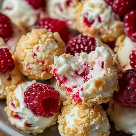 Delightful Raspberry Cream Cheese Bites Pretty Christmas Party Food, Cream And Berry Filled Pastry Balls, Raspberry Cream Cheese Bites, Fresh Raspberries Recipes, Raspberry Cream Cheese Cookies, Raspberry Bites, Cream Cheese Bites, Raspberry Cheesecake Bites, Strawberry Cheesecake Cookies