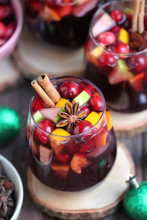 This holiday season serve up Holiday Spiced Red Wine Sangria for an easy and delicious cocktail perfect for any party or get-together! Best Red Wine For Sangria, Simple Red Sangria Recipes, Easy Red Wine Sangria, Home Made Sangria, Red Christmas Sangria, Best Red Sangria Recipes, Stella Rosa Wine Recipes Cocktails, Red Sangria Recipes Easy, Christmas Sangria Red