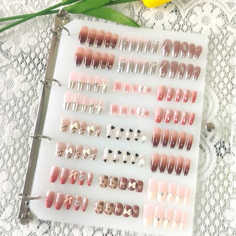 PRICES MAY VARY. 💅💅【One-Stop Service】-- Package Included：1pcs Press On Nail Storage Book +6pcs Inside Pages + 60pcs Double Sided Adhesive Strips + 3m Double Sided Tape. The enough quantity pages and tapes will perfectly meet all your needs. And we provide you with a 60 Day No-Questions-Asked Money-Back Assurance. 💅💅【Enough Storage Room】-- With 6pcs inside pages and enough double-sided tape, the press on nail organizer is a very easy and compact way to store 78-108 sets long/medium/short leng Press On Nail Packaging, Nail Supplies Organization, Nail Organizer, Nail Packaging, Nail Storage, Nail Organization, Nail Display, Nail Art Studio, Nail Tape