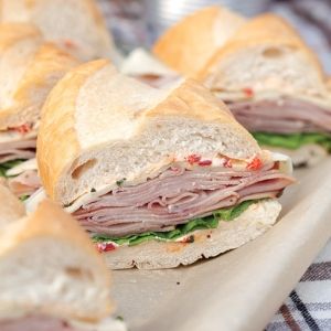 10 Great Sandwiches for a Crowd Picnic Sandwiches, Sub Sandwich, Summer Sandwiches, Slider Sandwiches, Paula Dean, Croissant Sandwich, Paula Deen Recipes, Sandwich Bar, Deli Sandwiches