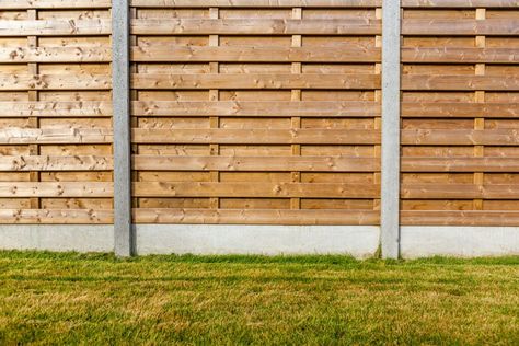 How Much Does a Privacy Fence Cost? A Guide to Privacy Fence Types, Materials, and More - Bob Vila Aluminum Fencing, Timber Logs, Privacy Fence Designs, Fencing Ideas, Solid Brick, Horizontal Fence, Types Of Fences, Patio Fence, Fencing Companies