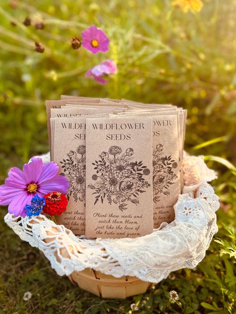 **Free standard shipping** Packets are $1.00 each, filled with 1/2 tsp of colorful wildflower seeds! Pure seed, no filler, approx 100 seeds. each seed packet contains a small paper card with planting instructions. This listing is NON CUSTOMIZABLE.   See my other listing for a customized version or message me for more info.  Kraft brown floral wildflower seed packet favors for your wedding or bridal shower.  Give your guests eco-friendly, beautiful wildflowers to take home & plant to remember your event.  Brown sealed packets  Size: 3 1/8" X 5 1/2" Annual/Perennial Wildflower Seed Mix suitable for all US Zones!  A rainbow of colors, 45 varieties, attracts butterflies, & bees. Flower Seed Favors, Wildflower Wedding Theme, Seed Packets Favors, Grow Wildflowers, Seed Favors, Bee Wedding, Let Love Grow, Bridal Shower Inspo, Seed Wedding Favors