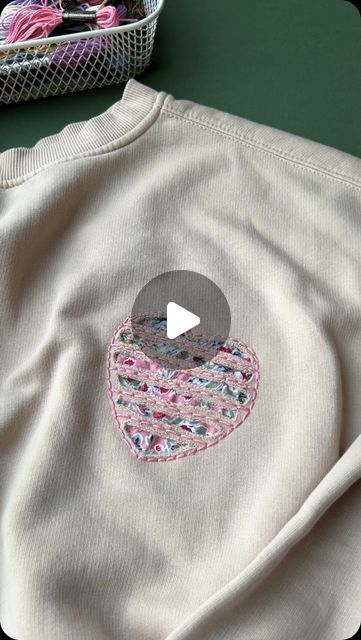 Jenny ~ Embroidery Art, Design & Crafts on Instagram: "Do you like this technique? It’s called reverse appliqué. I love a bit of texture 🩷
.
.
#sustainableclothing 
#handmadestyle 
#embroideryinstaguild 
#dmcembroidery 
#sewing 
#embroideryart 
#embroideryhoop 
#embroidered 
#embroideryartist 
#embroideryartwork 
#patchwork 
#reverseapplique 
#britishstitchers 
#embroiderywork 
#upcycledfashion 
#applique 
#handmadewithlove 
#embroideryhoopart 
#embroidelicious 
#florals
#modernembroidery 
#contemporaryembroidery 
#bordado 
#broderiemoderne 
#broderiemain 
#embroidery 
#handmadeembroidery 
#createdtocreate 
#handmadeisbetter 
#craftsposure" Applique And Embroidery Ideas, Reverse Embroidery Sweatshirt, Reverse Applique Sweatshirt Diy, Reverse Embroidery, Applique Designs Free, Reverse Applique Designs, Clothes Embroidery Diy, Clothing Crafts, Diy Sweater