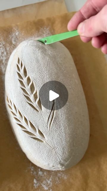 Daniel Larsson on Instagram: "The act of scoring sourdough is like the moment before a kiss – full of anticipation and tenderness, where a simple touch can create something beautiful and profound. 💋
Signed: A cheesy bread romantic.

#BreadScoring #ArtisanBread #SourdoughLove #BreadArt #CrustyLoaf #BakingJoy #Aourdough" Artisan Breads Rustic, Bread Scoring Patterns Loaf, Leaf Sourdough Scoring, Oval Loaf Scoring, Fancy Sourdough Scoring, Bread Loaf Scoring, Decorate Sourdough Bread, Sourdough Boule Designs, How To Use A Bread Lame