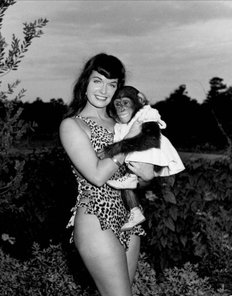 Bettie Page with chimp. photo Bunny Yeager Bettie Page Photos, Bunny Yeager, Monkey Christmas, Space Ghost, Pin Up Photos, Jet Black Hair, Pin Up Model, A Monkey, Bettie Page