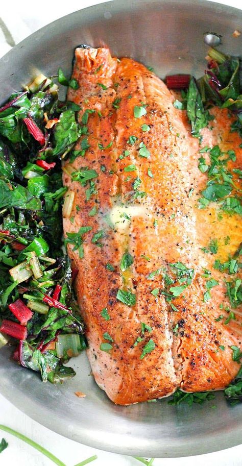 One Pan Garlic Butter Salmon and Swiss Chard- This healthy, gluten-free, low-carb recipe comes together in only 20 minutes! Can easily be made paleo or whole30 compliant by using ghee instead of butter. #easysalmon #garlicbutter #whole30dinner Chard Recipes Healthy, Swiss Chard Recipes, Garlic Butter Salmon, Chard Recipes, Butter Salmon, Swiss Chard, One Pan, Chard, Garlic Butter