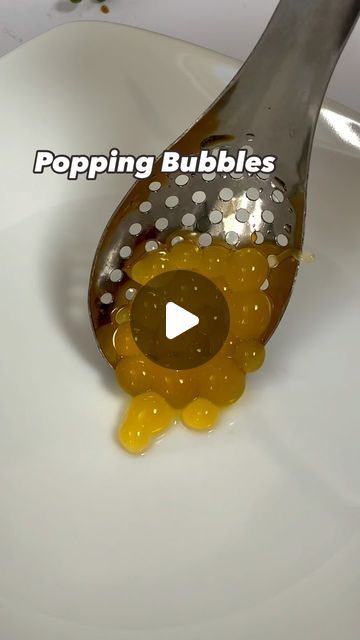 Dayeeta Pal | Hyper-realistic Cake Artist | Illusion Cakes on Instagram: "Who wants the recipe for boba popping bubbles?🤩  They are super simple : Vegan- no gelatine No heating Only 3 ingredients.  And yes, they pop!🤤😍  Comment “bubble” if you want the recipe 🫶🩷  Note: These are not like honey pearls which I shared earlier. Honey pearls need heating and are like little jelly balls." Popping Boba Recipe Gelatin, Honey Pearls, Boba Popping, Illusion Cakes, Jelly Balls, Popping Bubbles, Boba Recipe, Realistic Cakes, Cake Artist