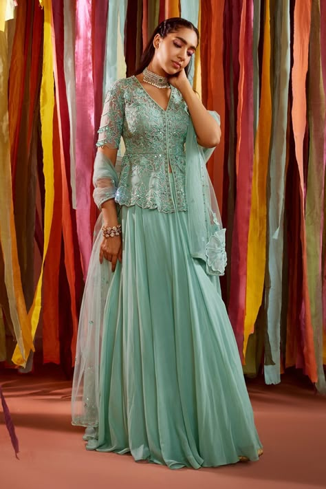 Shop for these amazing collections of Green Net Embroidered Zari V Neck Floral Peplum Top Skirt Set For Women by Label Sanya Gulati online at Aza Fashions. Green Combination Outfit Indian, Peplum And Skirt, Mehndi Engagement, Lehenga Top, Kurti Sleeves, Georgette Skirt, Happy Dresses, Floral Peplum Top, Net Dress