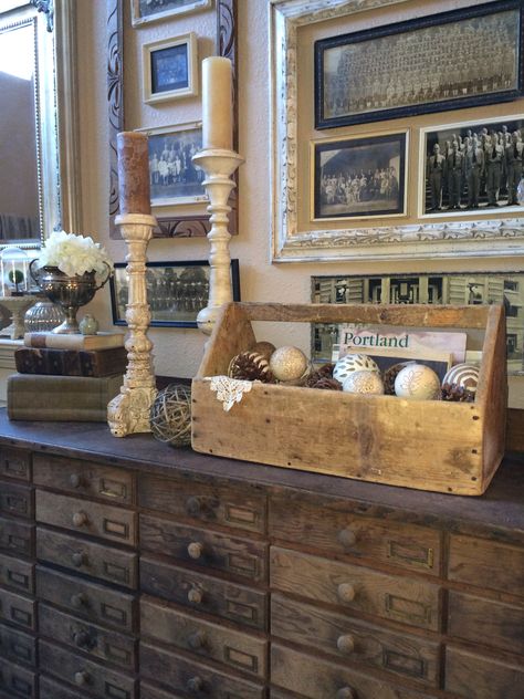 Old tool box, etc. Love the large frames around the smaller groupings! And the cabinet! Old Wooden Tool Box Decor Ideas, Wooden Tool Box Decor, Vintage Tool Box Decor, Wood Tool Box Ideas, Wooden Tool Box Ideas, Toolbox Decor, Tool Box Decor, Tool Box Ideas, Wooden Tool Box