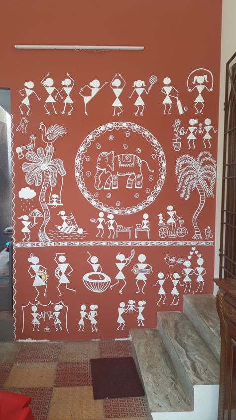 Warli wall painting, makeover of huge car parking wall, warli art, tribal art, diy wall art Mural Wall Art Indian Mural Wall Art, Varali Painting On Wall, Varli Art Rangoli, Traditional Wall Painting Indian, Warli Paintings On Wall, Warli Art On Wall, Worli Painting On Wall, Varli Painting Art On Wall, Warli Art Paintings On Wall