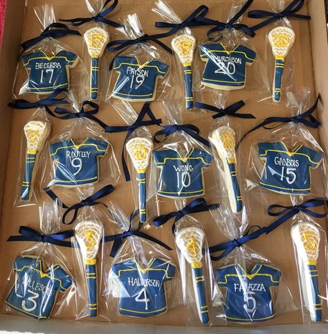 Lacrosse sugar cookies Lacrosse Cake Pops, Lacrosse End Of Year Banquet, Lacrosse Team Party Ideas, Lacrosse Senior Gifts, Senior Night Gift Ideas Lacrosse, Lacrosse Party Ideas, Senior Night Lacrosse Ideas, Lacrosse Centerpiece Ideas, Lacrosse Senior Night Ideas