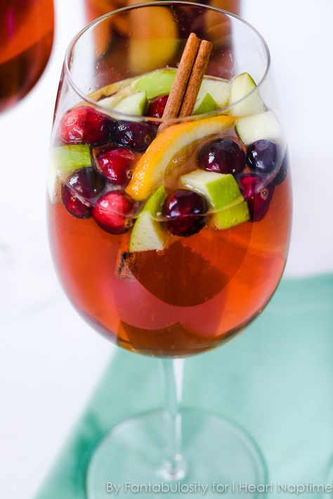 Holiday Sangria Mocktail- the perfect drink for any holiday party! Sangria Mocktail, Holiday Sangria Recipes, Nonalcoholic Party Drinks, Chopped Fruit, Best Non Alcoholic Drinks, Sparkling Grape Juice, Holiday Sangria, Festive Holiday Cocktails, Christmas Sangria