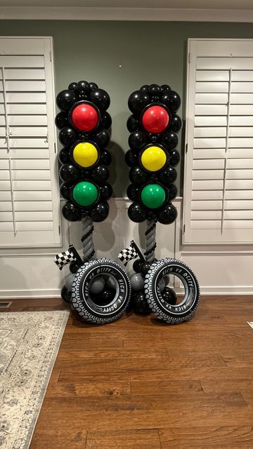 Victoria Dzierza on Instagram: "🚦 TRAFFIC LIGHT COLUMN 🚦

These traffic light balloon columns were a win for this race car-themed birthday party! I kept the traditional bright red, yellow, and green colors for the columns, but added muted colors to the garland for a twist on the primary colors 🏁. 

Want to recreate this look? I’ve posted the full step-by-step tutorial on my subscription page—check it out for all the details!🚦
.
.
.
.
.
.
.
#ballooncolumns #trafficlightparty #racecarparty #boysbirthday #birthdayballoons #themedballoons #balloonartist #balloondesign #ballooninspo #balloonstack #balloonsculpture #balloonstyling #montcopa #buckscountypa #balloonsbyvictoria" Traffic Light Party, Car Themed Parties, Car Birthday Theme, Cars Theme Birthday Party, Race Car Party, Balloon Sculptures, Balloon Columns, Decorations Party, Balloon Design