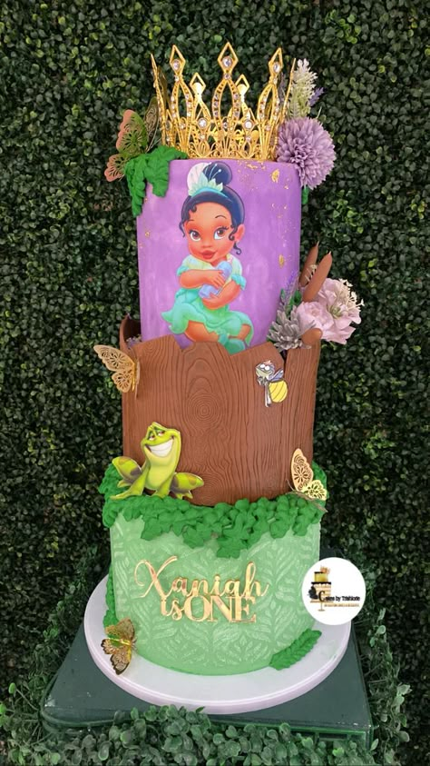 Princess Tiana Themed Birthday Party, Princess Frog Cake, Princess Tiana Birthday Cake Ideas, Baby Tiana Cake, Princess And Frog Theme Party, Princess And Frog Cake, Princess And Frog 1st Birthday, Princess And The Frog First Birthday Party Ideas, Princess In The Frog Birthday Party