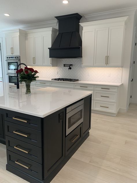 Black Hood White Cabinets, Black Hood Kitchen, Kitchen With Range Hood, Spec House, Kitchen Vent Hood, Kitchen Vent, White Shaker Cabinets, Neutral Kitchen, Kitchen And Bath Remodeling