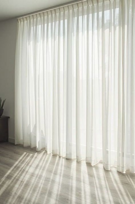 Let the sunlight and nature enter your room, soothing atmosphere, contemporary look and luxury feel as well as window decor by these sheer curtains.  Soft and smooth, light weight, high quality translucent fabric looks beautiful and charming. Chain weight in the bottom fold run through out the width to make the curtain stable as well as free flow. Can be used as a sheer effect to the window or behind the main curtains for a Royale look.   The curtains are made from wider width fabric (100% Polyester Voile) and there's no seams whatever the ready curtain width will be. PLEASE NOTE: ANY WIDTH TILL 108 INCHES LENGTH THERE ARE NO SEAMS. FOR EXTRA WIDE CURTAINS LIKE 228 WIDE TO ANY WIDTH AND  FROM 109 INCHES LENGTH TO ANY LENGTH, THERE ARE SEAMS TO MAKE THE WIDER WIDTH CURTAINS BECAUSE OF FABRI Sheers Curtains Living Room, Extra Wide Curtains, Armani Casa, Plain Curtains, Dekorasi Kamar Tidur, Long Curtains, Curtains Living, Modern Curtains, White Curtains