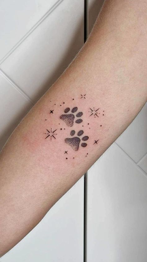 Delicate Paw Print Tattoo, Pet Paw Tattoo Ideas, Dog Star Tattoo, Cat Paw Tattoos For Women, Kitten Paw Tattoo, Fine Line Dog Paw Tattoo, Keeshond Tattoo, Cat Memorial Tattoo Paw, Cat Paw Print Tattoo Ideas