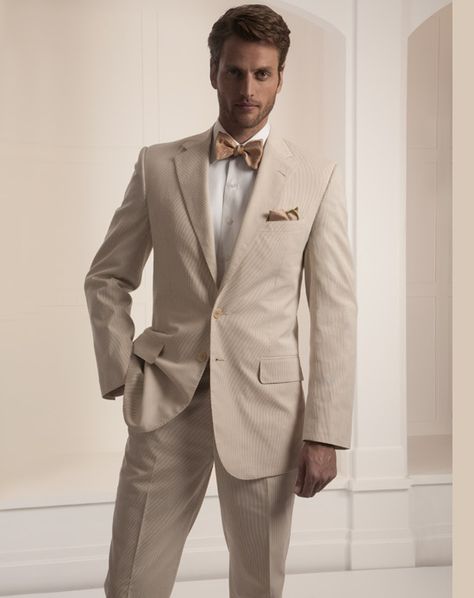 tan w/ brown, not a traditional grooms tuxedo, yet still classy look, love the vintage preppy w/ bowtie. Beige Groom, Tan Suits, Light Blue Bow Tie, Summer Ceremony, Beige Suit, Bow Tie Suit, Cream Suit, Wedding Tux, Groom Bowtie