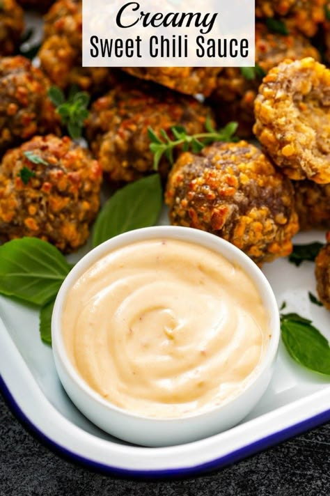 This easy Creamy Sweet Chili Sauce is made with just 3 ingredients whisked together to create an amazing dipping sauce for chicken, sausage balls or vegetables! #SweetChiliSauce #CreamySweetChiliSauce #ChiliSauce #Sauce #SauceRecipe #DippingSauce #SausageBalls Easy Sausage Balls Recipes, Recipe For Sausage, Sausage Balls Bisquick, Sausage Cheese Balls, Sweet Chili Sauce Recipe, Cream Cheese Sausage Balls, Honey Mustard Recipes, Sausage Balls Recipe, Dipping Sauces For Chicken