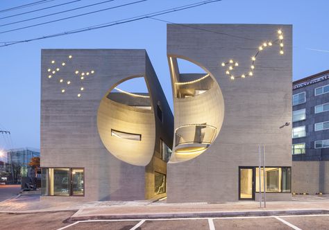 Image 1 of 41 from gallery of Two Moon / Moon Hoon. Photograph by Nam Goongsun Architecture Cool, Modern Architecture Design, Concrete Facade, Moon Moon, Cultural Centre, Cultural Architecture, Unique Buildings, Cultural Center, Futuristic Architecture