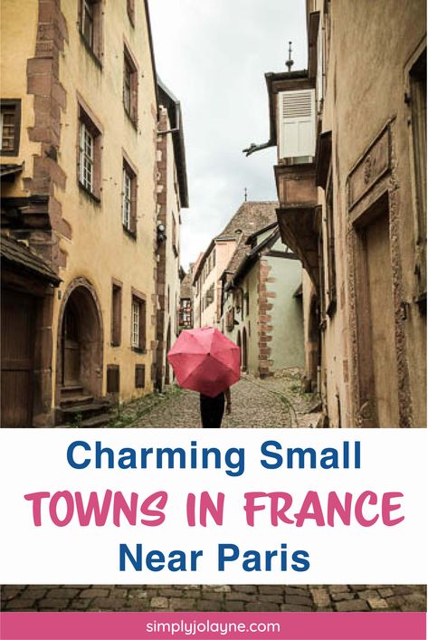 Young girl walk along a street in a small French town with a pink umbrella. Day Trips From Paris By Train, France By Train, Cities In France, Best Paris Hotels, Day Trips From Paris, Culture Of France, Visiting Paris, Day Trip From Paris, Travel Facts