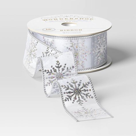 Make your gifts sparkle this holiday season with this 1.5-Inch Sheer Fabric Snowflake Christmas Ribbon from Wondershop™. The sheer fabric, embellished with snowflakes and subtle color highlights, adds a festive touch to any present. Plus, with 15 feet on the roll, it offers plenty of length for wrapping gifts for everyone on your list. Welcome to the Wondershop™. Fabric Snowflake, Christmas Glitter Ornaments, Color Highlights, Christmas Glitter, Wrapping Gifts, Large Gift Bags, Rainbow Gift, Glitter Ornaments, Womens Ministry