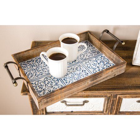 "Use as a serving tray or as a decor holder on your coffee, console, and kitchen tables for a useful decorative piece. Whether in your kitchen, or on your coffee table, it's a great way to display and store your favorite things. Use as standalone or set organizing or serving trays inside your farmhouse-themed home spaces. Suitable for indoor use only. Each set comes with 2 trays. Farmhouse design. Please note that this item is for decorative purpose use only and are not food safe. This item ship Wood Living Room Decor, Ottoman Coffee Table Tray, Rustic Tray, Farmhouse Tray, Serving Tray Set, Display Coffee Table, Into The Wood, Wood Farmhouse, Ottoman Tray