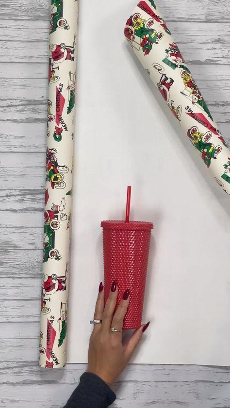 How to gift wrap a tumbler #giftwrapping #wrappinggifts #wrappingpresents | Instagram How To Wrap Cups Gift Ideas, Wrapping Cups Gift, Cup Gift Wrapping Ideas, Starbucks Cup Gift, Christmas Cookies Packaging, Bottle Gift Wrapping, Bucket Gifts, Best Gift Baskets, Inexpensive Christmas Gifts