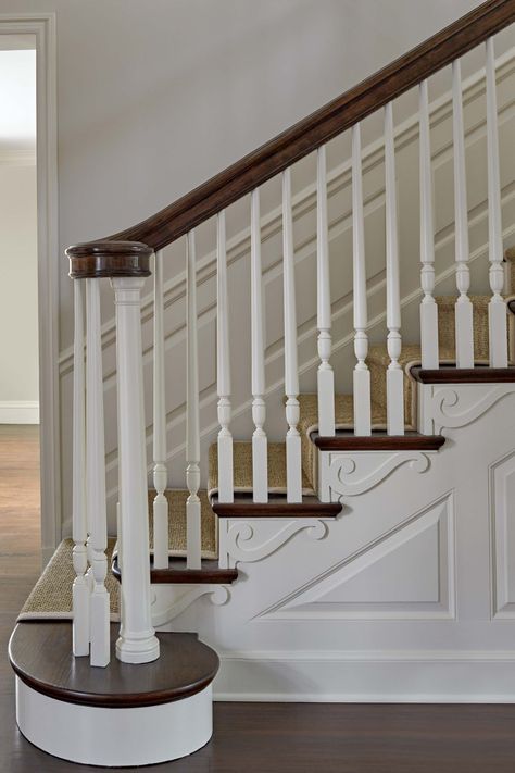 The new stair railing has custom white baluster and a highly polished handrail. #walnutfloors #treadbracket #stairway #wallpanel #stairrailing #englishcountryhome #georgianstyle #traditionalarchitecture Georgian Revival Homes, Home Under Construction, Wooden Staircase Design, Georgian Revival, Staircase Interior Design, Staircase Railing Design, Handrail Design, Traditional Staircase, House Staircase