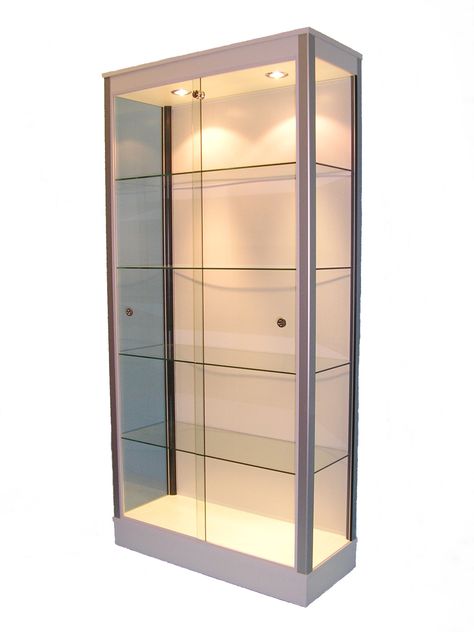 Large glass display cabinet in white with LED lights in top rail. Display Cabinet With Lights, Display Glass Cabinet, Glass Display Cabinet Ideas, Glass Showcase Cabinet, Champagne Display, Glass Display Unit, Display Cupboard, Display Cabinet Lighting, Glass Cupboard