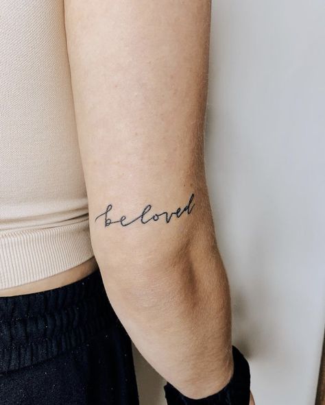 #tattootattoo #tattoo #tattooideas #tattooart #beloved #tattooword #wordtattoo #smalltattoo #smalltattooideas #tattoosforwomen #tattooart Beloved Tattoo Font, Tattoo Top Of Shoulder, My Beloved Tattoo, Dainty Tats, Chosen Tattoo, Tattoos Simplistic, Tattoo Cursive, Beloved Tattoo, Joy Tattoo