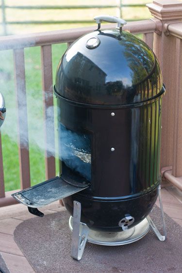 A loaded Weber Smokey Mountain BBQ Smoker - Grilling24x7 Weber Smokey Mountain Recipes, Wood Stove Heater, Weber Smokey Mountain, Outdoor Smoker, Bbq Dry Rub, Charcoal Smoker, Franklin Bbq, Weber Bbq, Smoker Cooking