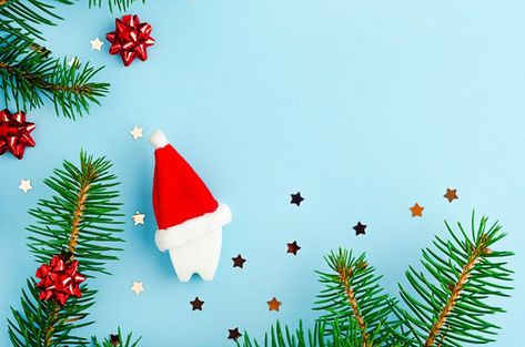 Fir branches, creative toy tooth in red ... | Premium Photo #Freepik #photo #christmas #party #medical #santa Dental Christmas, Red Santa Hat, Medical Dental, Space Place, Photo Christmas, Premium Photo, Santa Hat, Blue Background, Blue Backgrounds