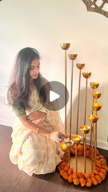 Gowthami Sagi | DIY, Home Design & Decor on Instagram: "Comment “Diwali” for all the links and detailed step by step tutorial for this budget friendly project 🪔  Each year, this DIY collaboration becomes even more special—not just for these incredible women, but also for my daughter. Wishing you a joyful Diwali filled with warmth, love, and memorable moments with family and friends ❤️.  #diwalidecor #diwali2024 #budgetDIYs" Diwali Decorations At Home, Diy Diwali Decorations, Diwali Party, Diwali Craft, Diwali Diy, Stage Decorations, For My Daughter, Diy Creative Crafts, Wedding Stage