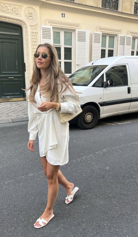 white hermes oran sandals outfit, white hermes sandals outfit, hermes sandals, hermes sandals outfit street styles, hermes sandals outfit, lovisa barkman, lovisa barkam outfit, lovisa barkman style, beige chanel flap bag outfit, lovisa barkman hair, lovisa barkman instagram, beige chanel bag, beige chanel bag outfits, beige chanel bag aesthetic, saint tropez style, saint tropez aesthetic, saint tropez style White Hermes Sandals, Hermes Sandals Outfit, Hermes Oran Sandals Outfit, St Tropez Style, Sandals Outfit Summer, Hermes Sandals, Hermes Oran Sandals, Slippers Outfit, White Birkenstocks