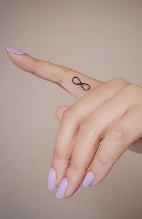 Infinity Finger Tattoos, Finger Tattoos Fade, Side Finger Tattoos, Inner Finger Tattoo, Finger Tattoos Words, Middle Finger Tattoos, Tiny Finger Tattoos, Cute Finger Tattoos, The Trend Spotter