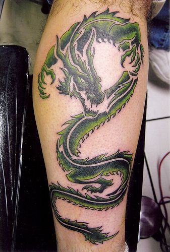 Green Dragon Tattoo by Sacred Heart Tattoo, Lincoln NE, via Flickr Dragon Tattoo On Leg, 3d Dragon Tattoo, Dragon Tattoo Leg, Black Dragon Tattoo, Tattoo On Leg, Dragon Tattoos For Men, Small Dragon Tattoos, Green Tattoos, Dragon Sleeve Tattoos