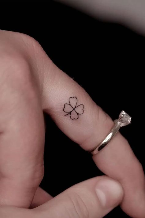 For centuries, four-leaf clovers have been the symbol of luck. Countless people are obsessed with it, believing fortune will come their way… Clover Tattoo Ideas, 4 Leaf Clover Tattoo, Leaf Clover Tattoo, Four Leaf Clover Tattoo, Tattoo Artists Near Me, Clover Tattoo, Shamrock Tattoos, Small Girly Tattoos, Hand Tattoos For Girls