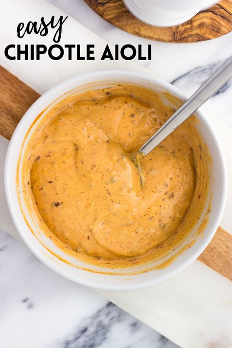 This chipotle aioli is just the sauce to jazz up sandwiches and burgers, dip vegetables or fries, and more. Made with a shortcut with mayonnaise as a base, it’s easy to adjust the spice level to your liking. Chipotle Aoli Recipe, Chipotle Aioli Recipe, Aoili Recipe, Homemade Aioli, Roasted Garlic Hummus, Aioli Sauce, Chipotle Aioli, Aioli Recipe, Chipotle Sauce