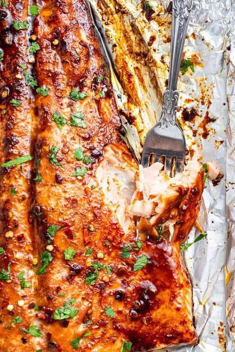 close up on flaking firecracker salmon with a fork Spicy Salmon Recipes, Firecracker Salmon Recipes, Firecracker Salmon, Protein Dinners, Salmon Recipes Oven, Dinner Salmon, Oven Salmon, Salmon Salad Recipes, Oven Baked Salmon