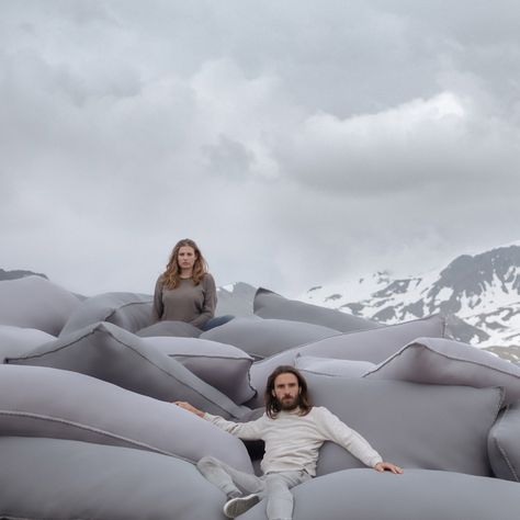 Recalling the sandbag barricades used in war zones, piles of haphazardly stacked cushions form this public seating installation by French furniture brand Smarin. Pillow Art Installation, Quiet Room, Public Seating, Art Basel, Blue Box, French Furniture, Basel, Wall Treatments, At Last