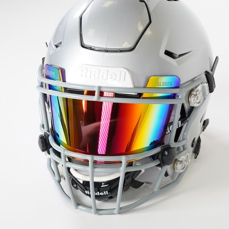 Assortment of Colors to Pair with Any Uniform Combo Football Visors have quickly become one of the most stunning displays of style and intimidation. Sleefs impact and scratch-resistant visors allow you to storm the field with an extreme level of confidence. There are over 50 colors/styles meant to pair with any uniform and give you an all-pro look. Sleefs visors also provide durability and can be used repeatedly throughout a season. Most importantly, the material stays compact, allowing maximum Viper Glasses, Pit Viper Glasses, Custom Football Cleats, Football Visor, Cool Football Helmets, Football Room, Football Shoulder Pads, Football Rooms, Football Drip